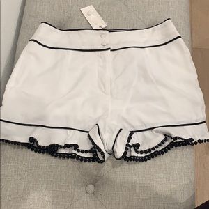 Sugar and lips White shorts with black trim